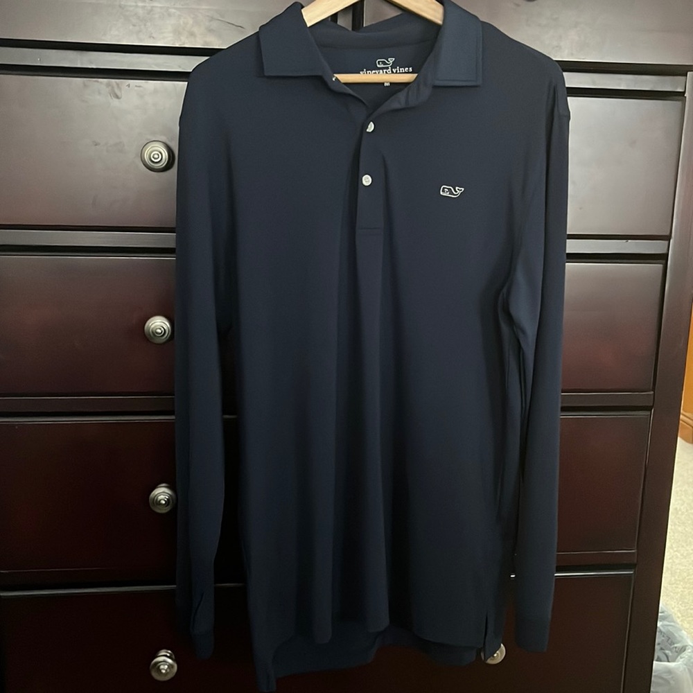 Barely used long sleeve blue polo. Great condition